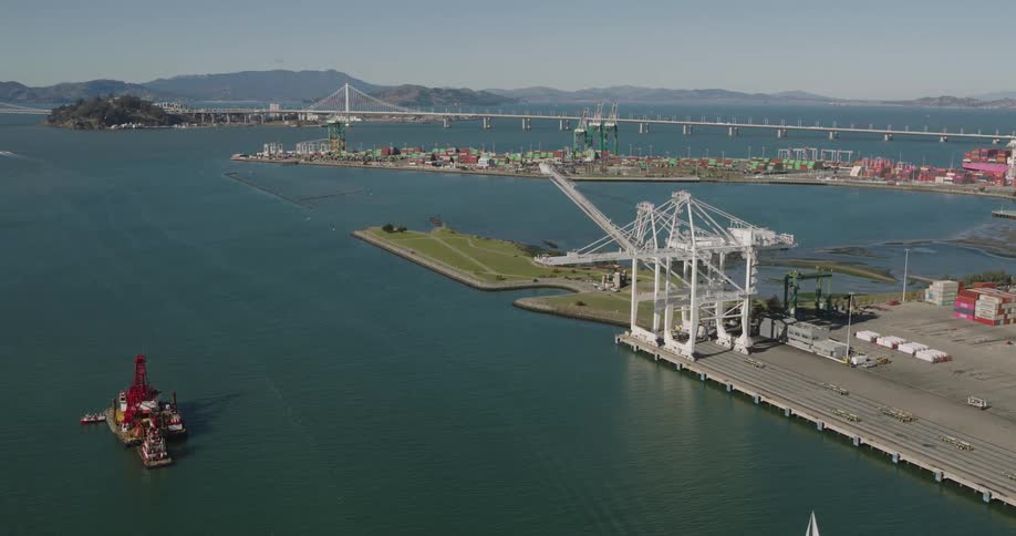 The harbor is near the bridge