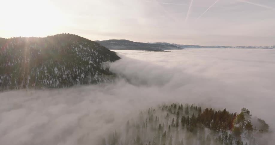 Aerial view of clouds over the mountain forests