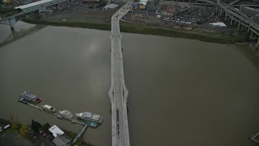 View of a bridge over the sea amidst a city