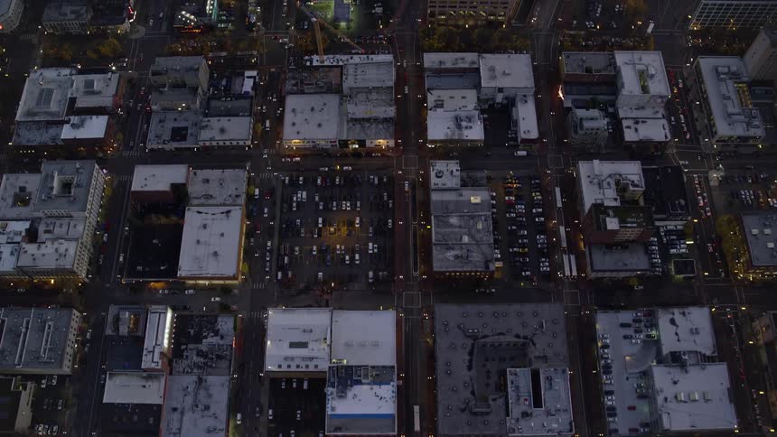 Aerial panorama of a nighttime metropolis with intersections