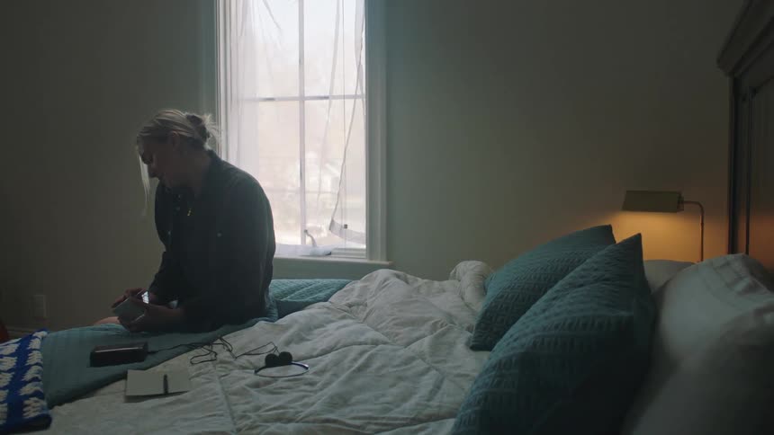 A woman in the room answering the phone