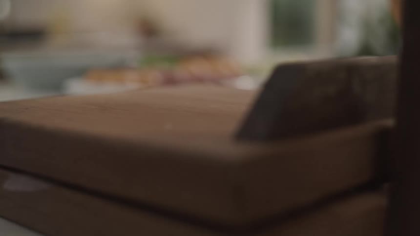 A person presses dough with a device