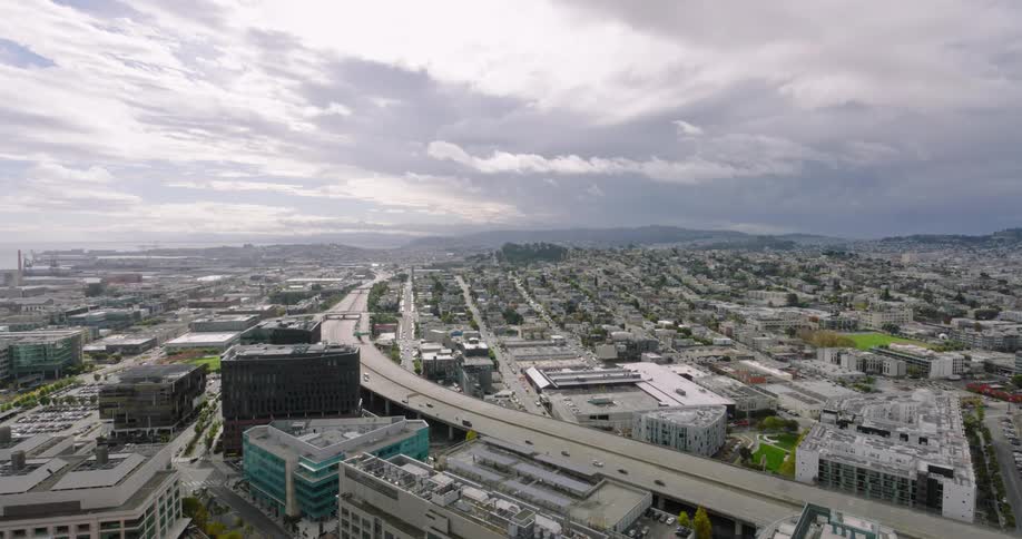 Aerial panorama of a metropolis with a highway and buildings