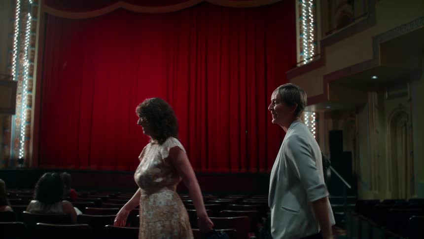 Couple finding their seats in the theatre