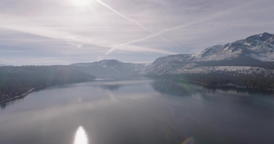 The lake is near the snow covered mountain