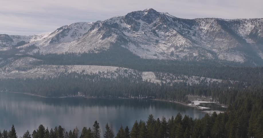 Aerial view of lake tahoe and snow covered mountains