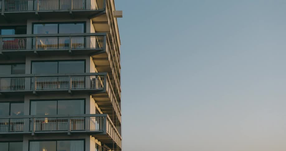 Aerial view of an apartment building at evening