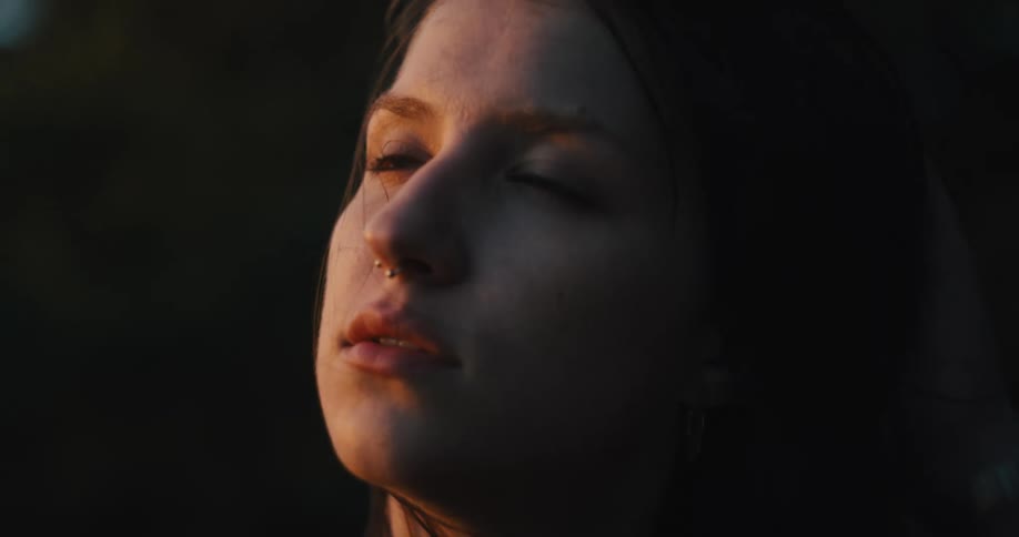 Close up of the face of a long haired woman