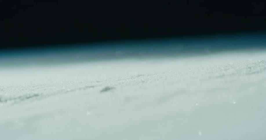 The light reflects off the sand