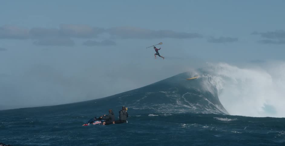Surfer kick out of wave at Jaws
