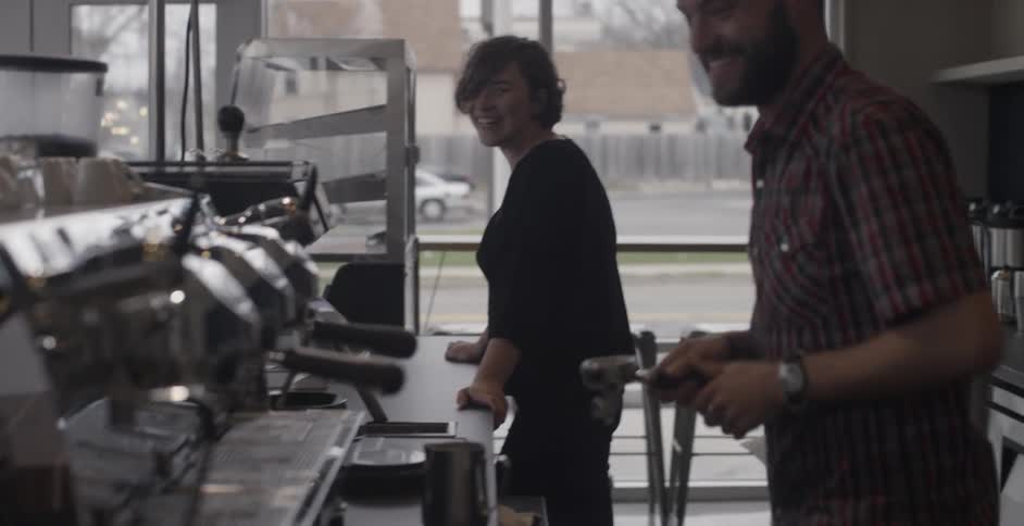 People are working in a coffee shop