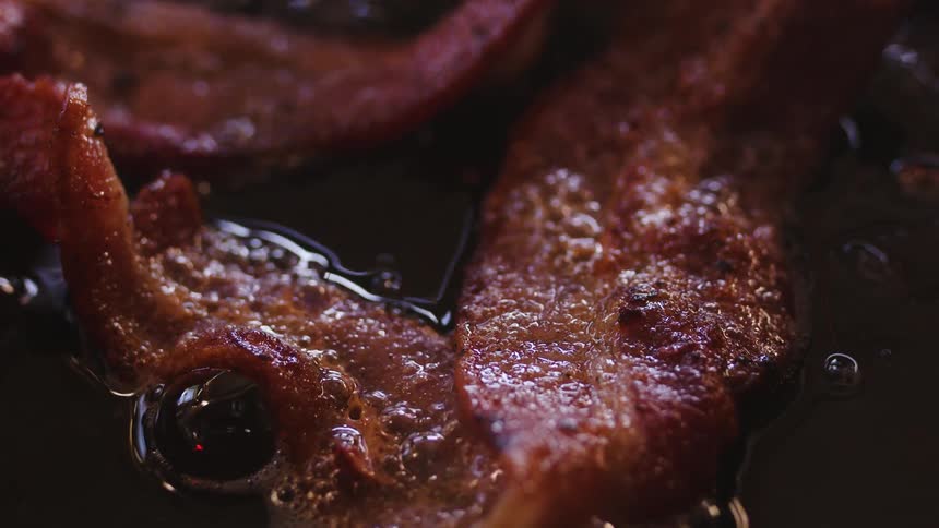 Bacon frying in grease