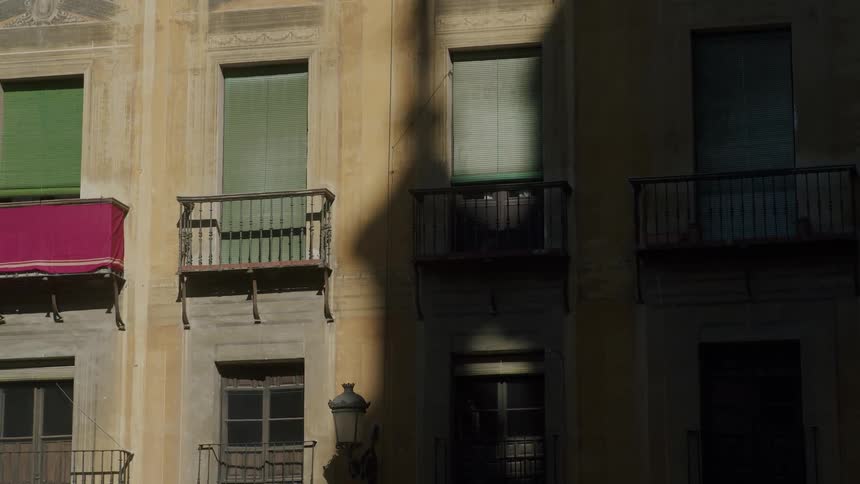 Exterior view of an apartment building with balconies