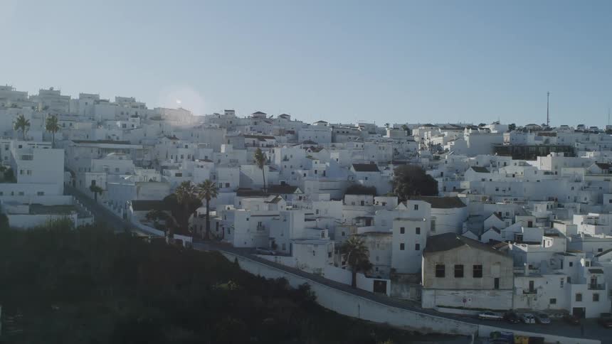 Panoramic view of an urban city with all the houses in white on a day with a blue sky and no clouds