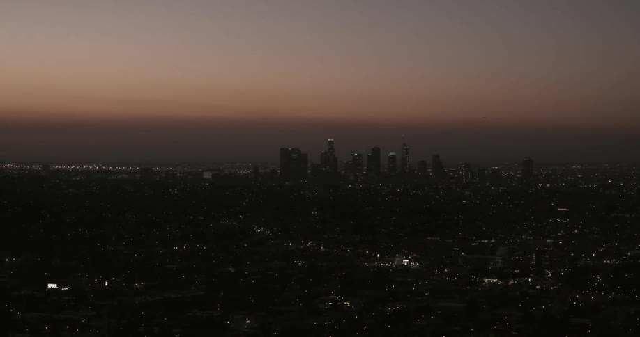 City lights shine and sparkle at dusk