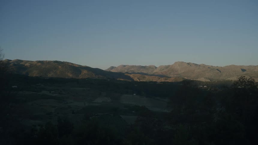 The mountains are under a clear sky