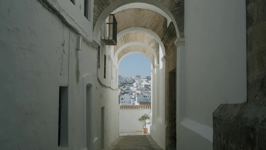 The alley leads to the city