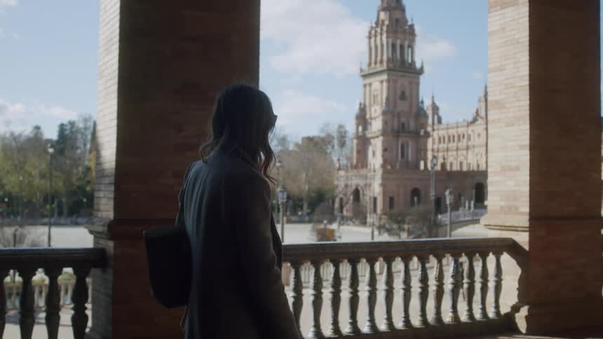 Woman walking in a church aisle