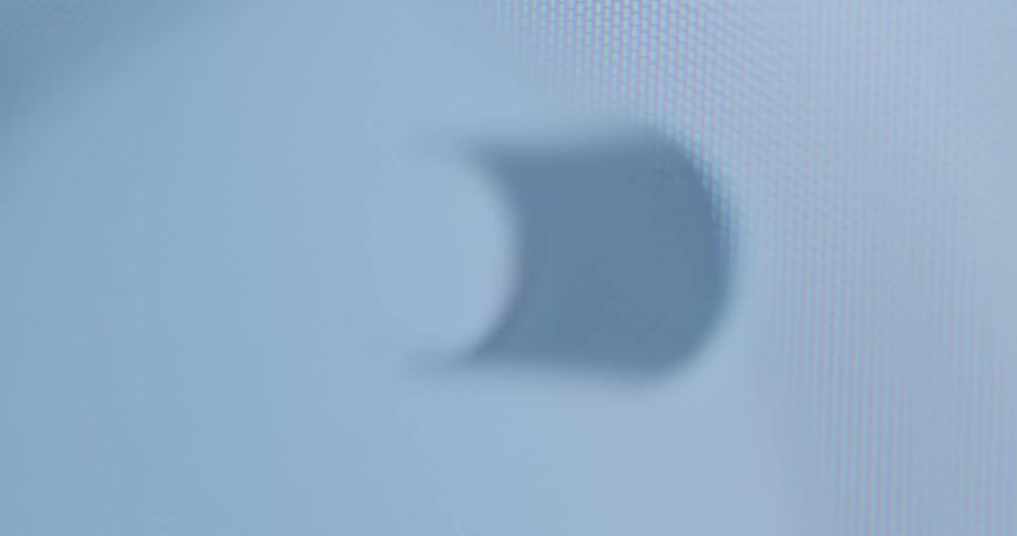 Extreme closeup of a screen with apple style power button in both on and off positions automatically switching between active and unactive setting