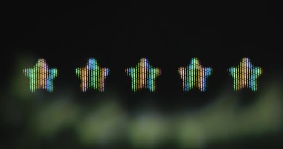 Animated golden stars pop up on a digital screen as symbol for a five-star review for great customer feedback for a great service or customer experience