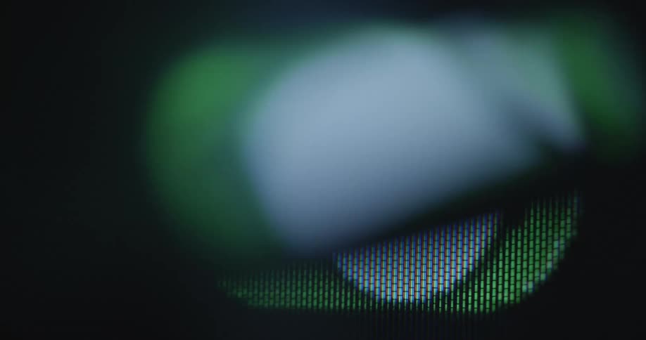 The animated and automated on and off button switches between the green and the red setting on a pixelated tube television screen with dynamic handheld camera movement