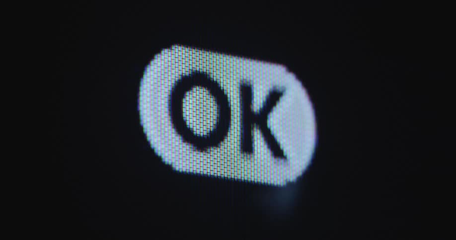 PC user moves cursor arrow and clicks onto OK button animation to express approval or agreement or consent displayed on a 1990s computer screen with RGB pixels