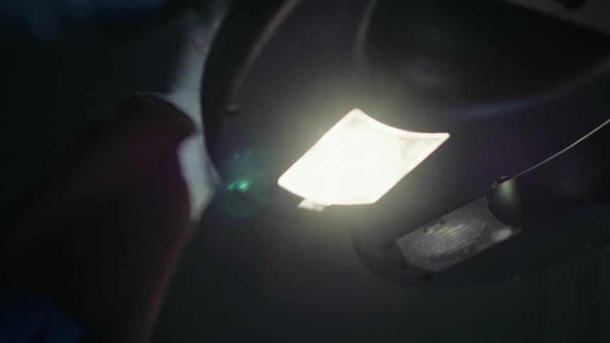 Closeup of a mans hand turning on the lights