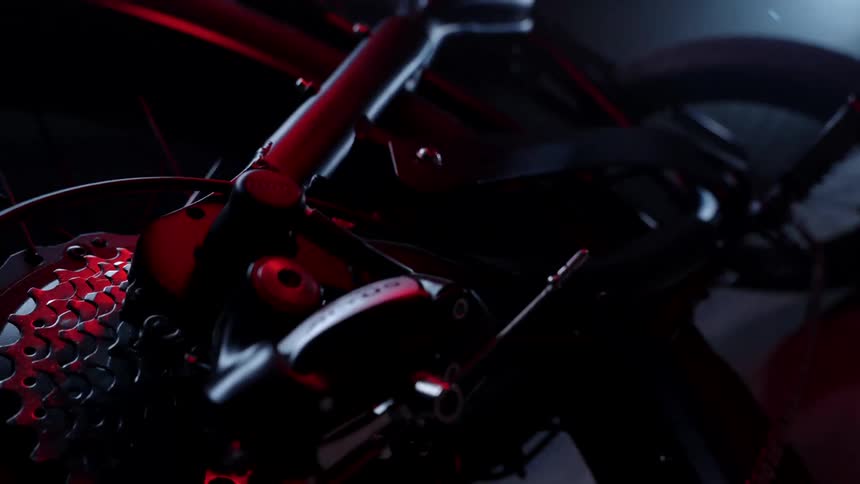 A closeup view capturing the bicycles speed cassette and tire