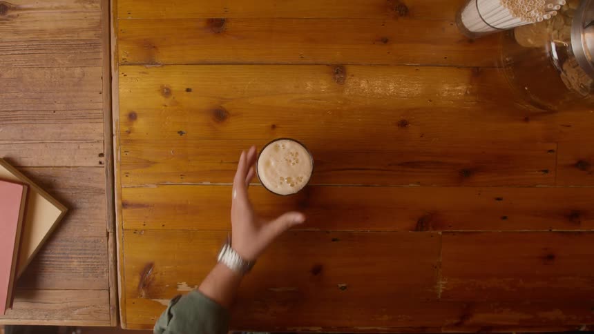 A beer is served in the bar