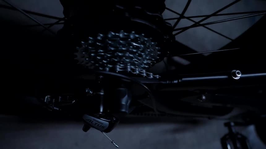 A close up view of the bicycles cassette