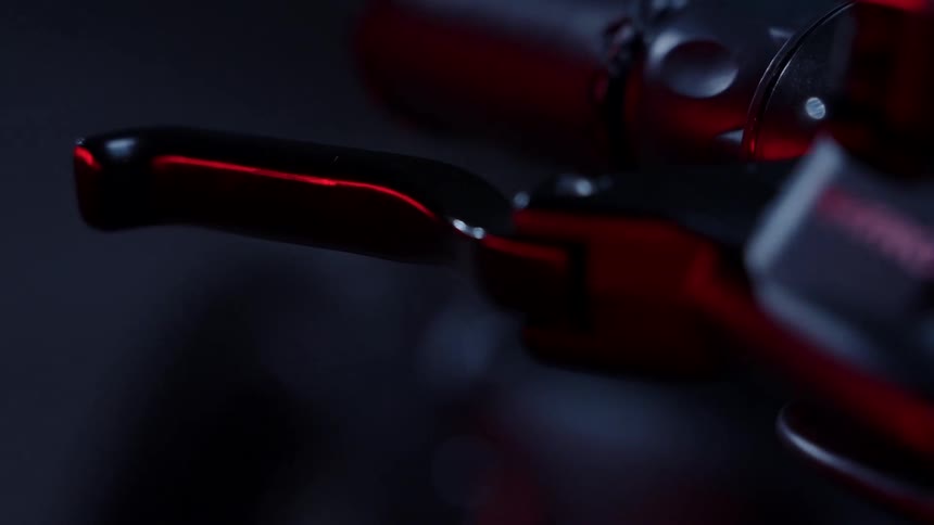 Close up of the brakes on the handlebar of a bicycle
