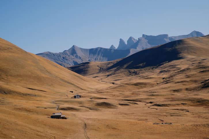 Huts in the desert between mountains