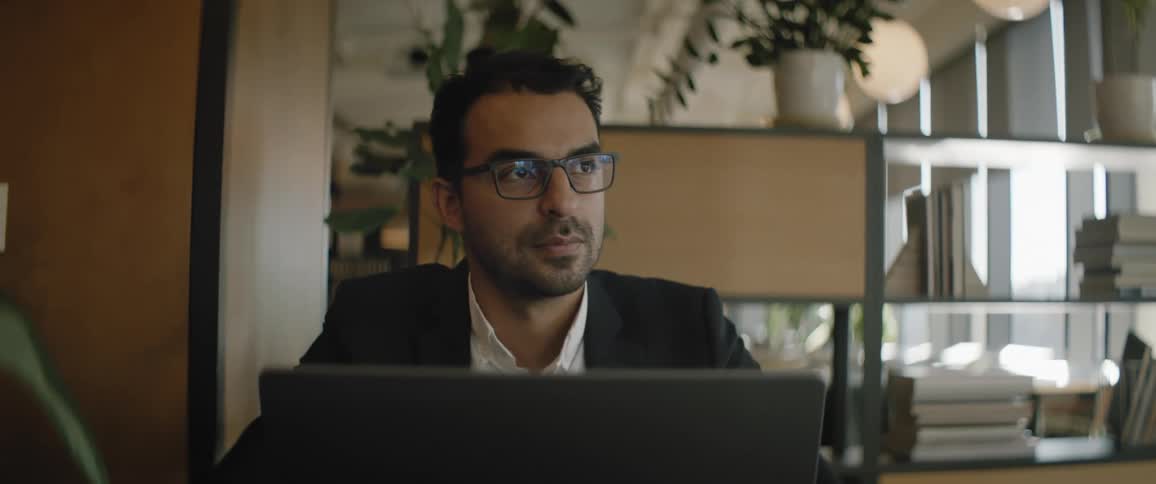Businessman working on a laptop in the office