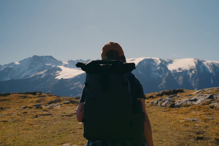 A person is hiking on the mountain