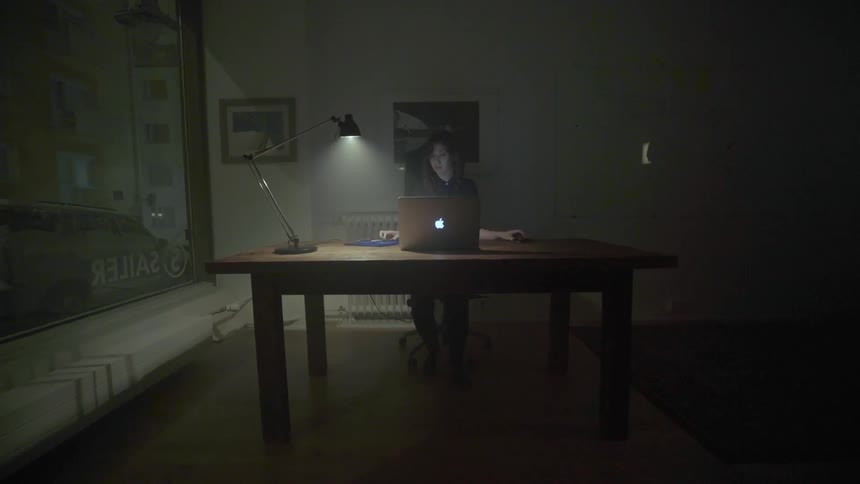 A dedicated writer launches her digital workspace to capture sudden late night inspiration.