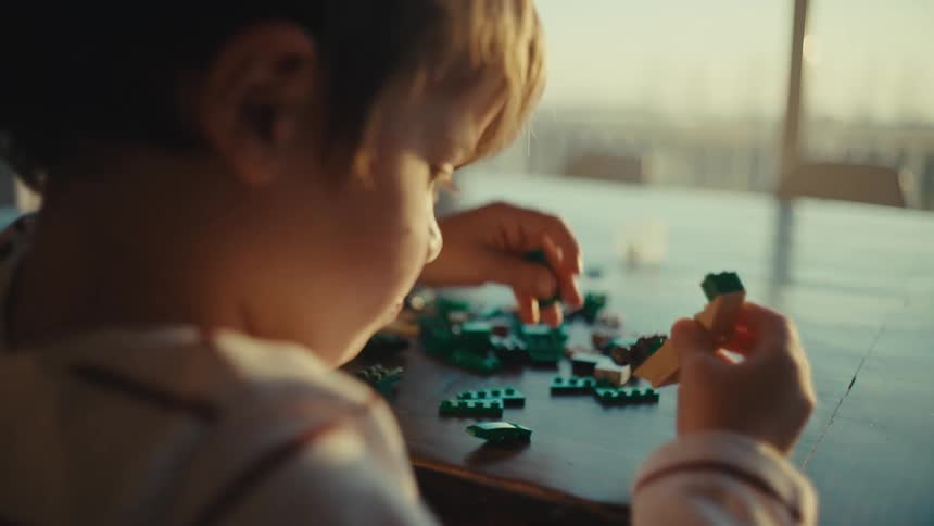 A child is building with legos