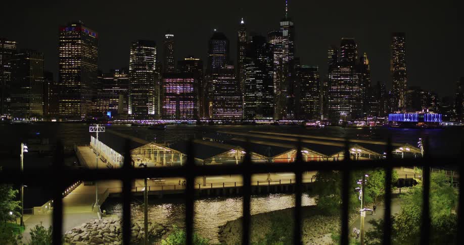 The city is brightly lit at night