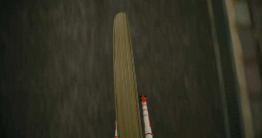 A bicycle is riding on the road