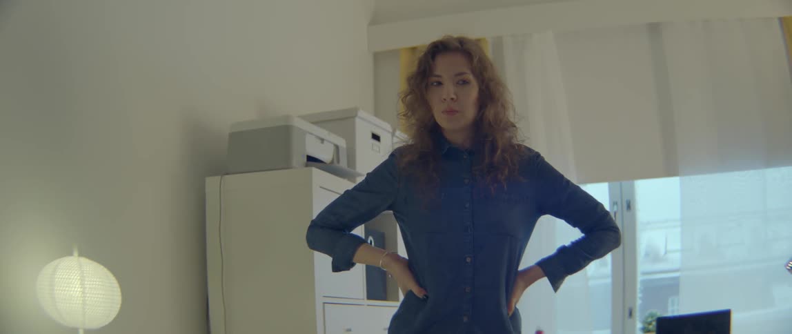 A frustrated girl sighs and looks around a bedroom while feeling completely lost.
