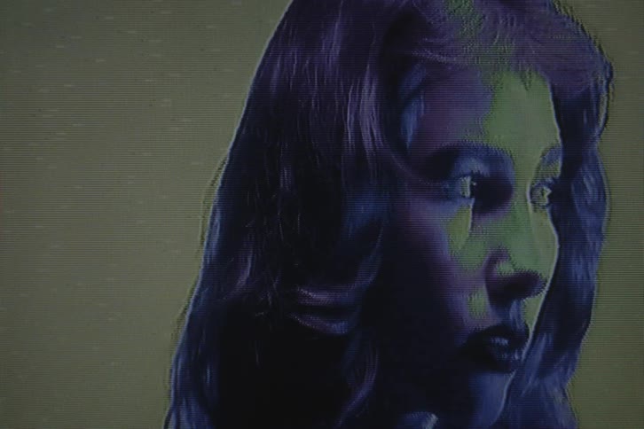 A woman looks around