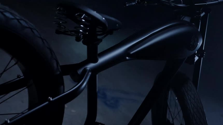 Light shines onto bicycle parked in dark area