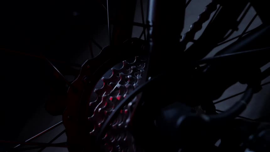 Orbiting close up of bicycle gears