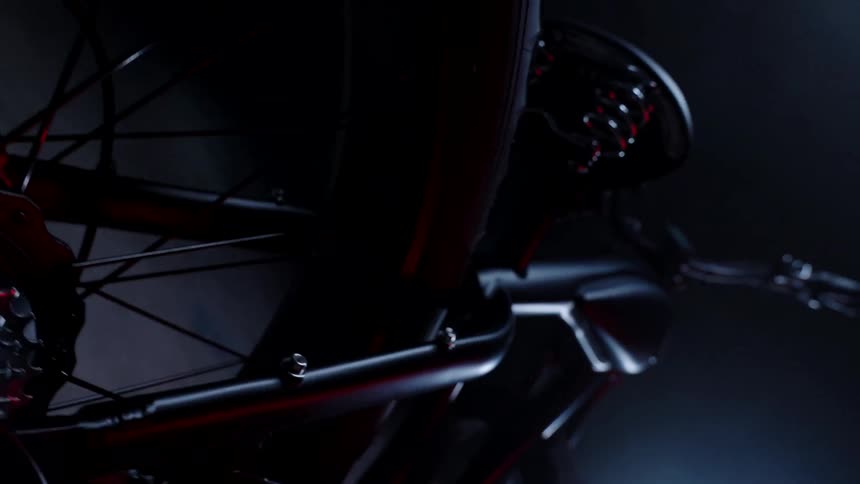 A bicycle is parked in the garage