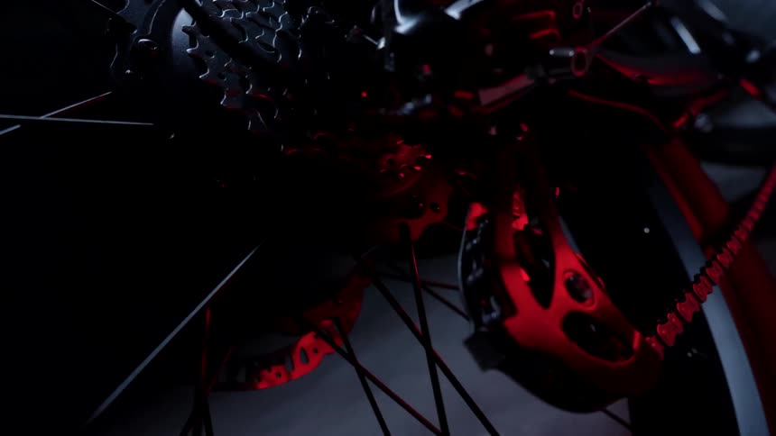 The bike chain is on the wheel