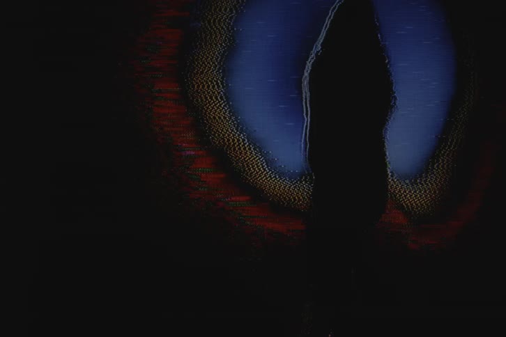 A young girl dancing in a dark room