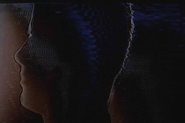 Silhouette of a man modeling with vhs video distortion