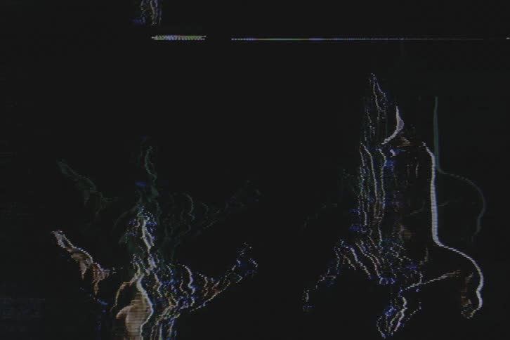 Silhouette of a performer dancing with vhs video distortion