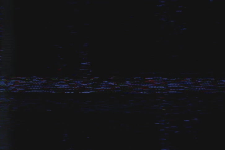 Two people dance in the static film