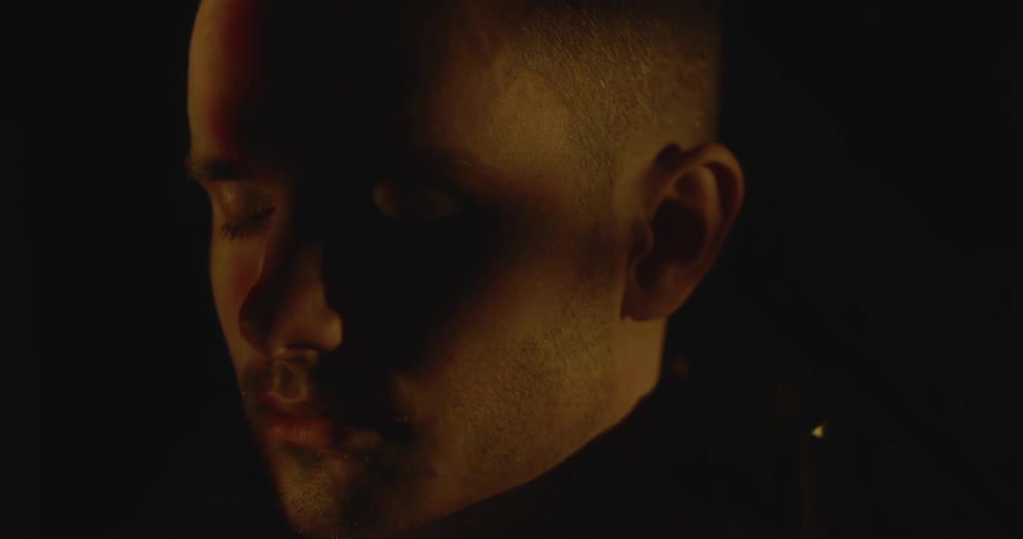 The light shines on the mans face