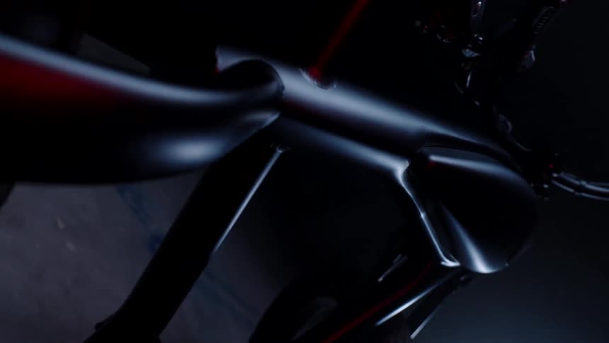 Closeup of a motorized bicycle in a dark environment